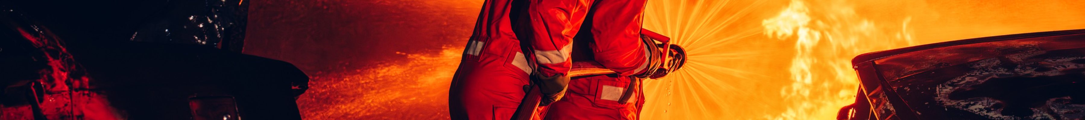 Fearless Firefighters Battling Blaze with Water and Extinguishers.